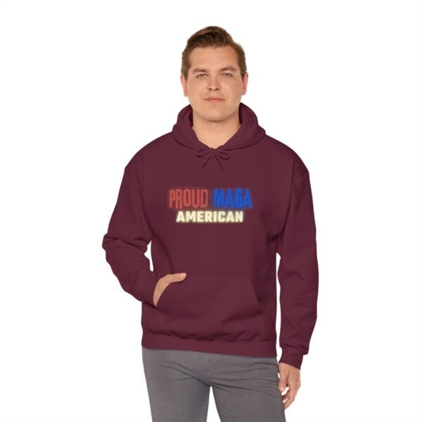 Burgundy "Proud MAGA American" hoodie with bold red, blue, and yellow text on the front, showcasing patriotism with a striking design.