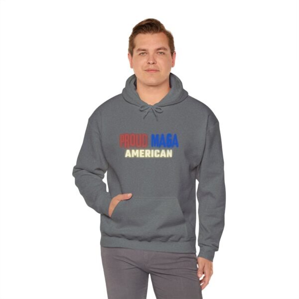 Front view of the Proud MAGA American hoodie in charcoal gray, worn by a male model. Features bold red, white, and blue text with a patriotic message. A comfortable and stylish conservative sweatshirt for those who love American values.