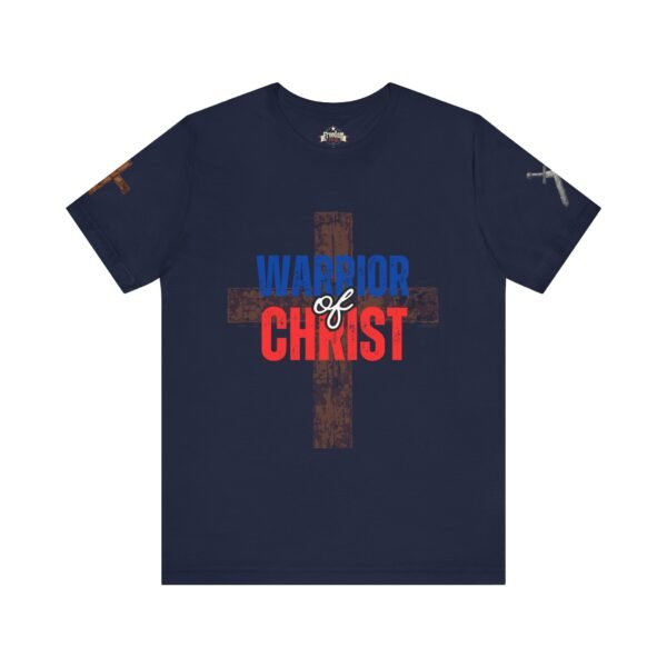 Navy blue "Warrior of Christ" T-shirt with a distressed wooden cross background, bold red and blue lettering, and faith-inspired Christian apparel design.