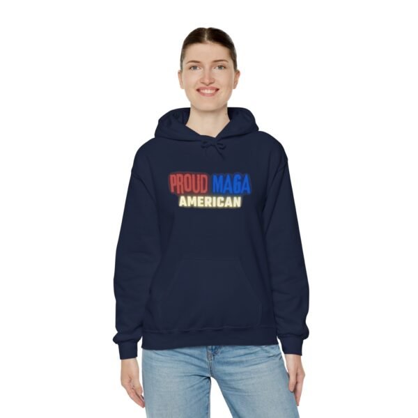 Navy blue "Proud MAGA American" hoodie with bold red, blue, and yellow text across the chest, emphasizing patriotism.