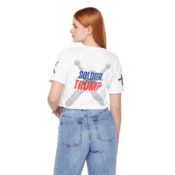 White "Soldier for Trump" cropped T-shirt with crossed swords and patriotic red, white, and blue lettering. Pro-Trump conservative apparel.