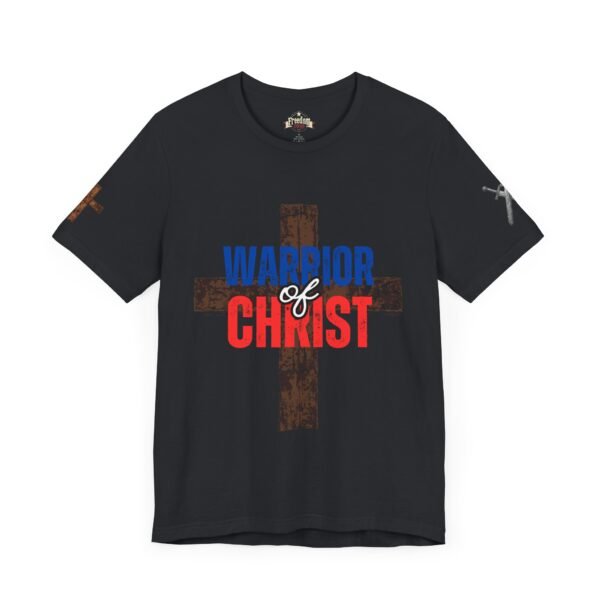 Black "Warrior of Christ" T-shirt featuring a distressed brown cross and bold red, white, and blue text. Christian faith-based apparel with a strong patriotic theme.