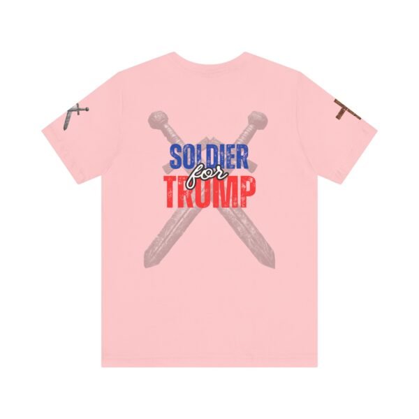 A pink Soldier for Trump T-shirt featuring bold patriotic lettering and crossed swords, symbolizing strength, faith, and unwavering conservative values.