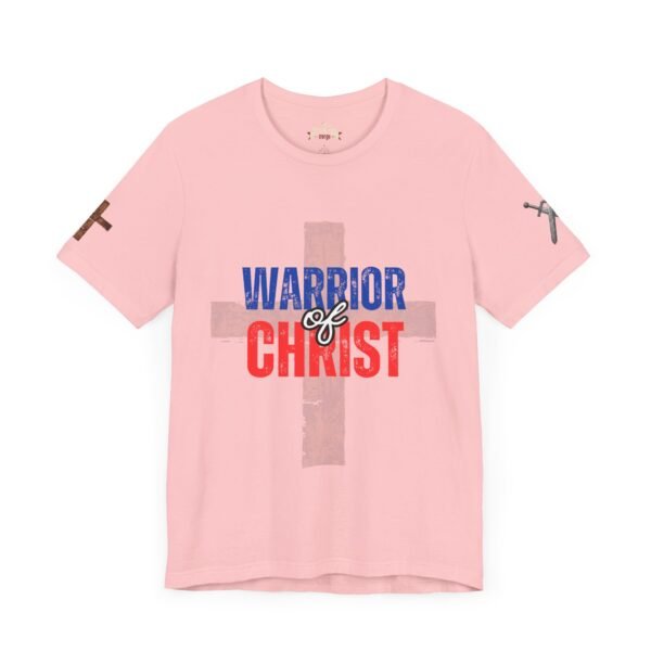 A pink Warrior of Christ T-shirt featuring a distressed cross and patriotic lettering, designed for faith-driven individuals who stand strong in their beliefs.