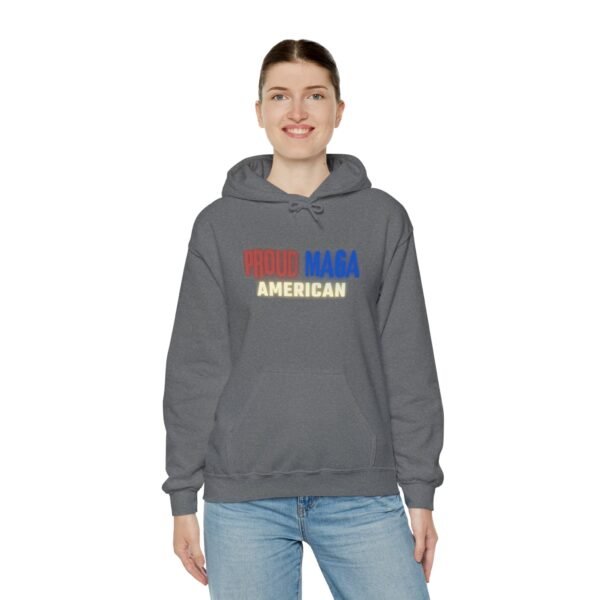 Front view of the Proud MAGA American hoodie in dark gray, worn by a female model. Features bold red, white, and blue text with a patriotic message. A stylish and comfortable conservative sweatshirt for those who support American values.